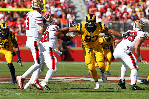 Ndamukong Suh  la charge sur C.J. Beathard 